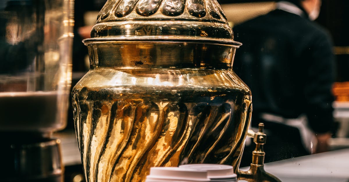 How do I clear a clogged hot water system?