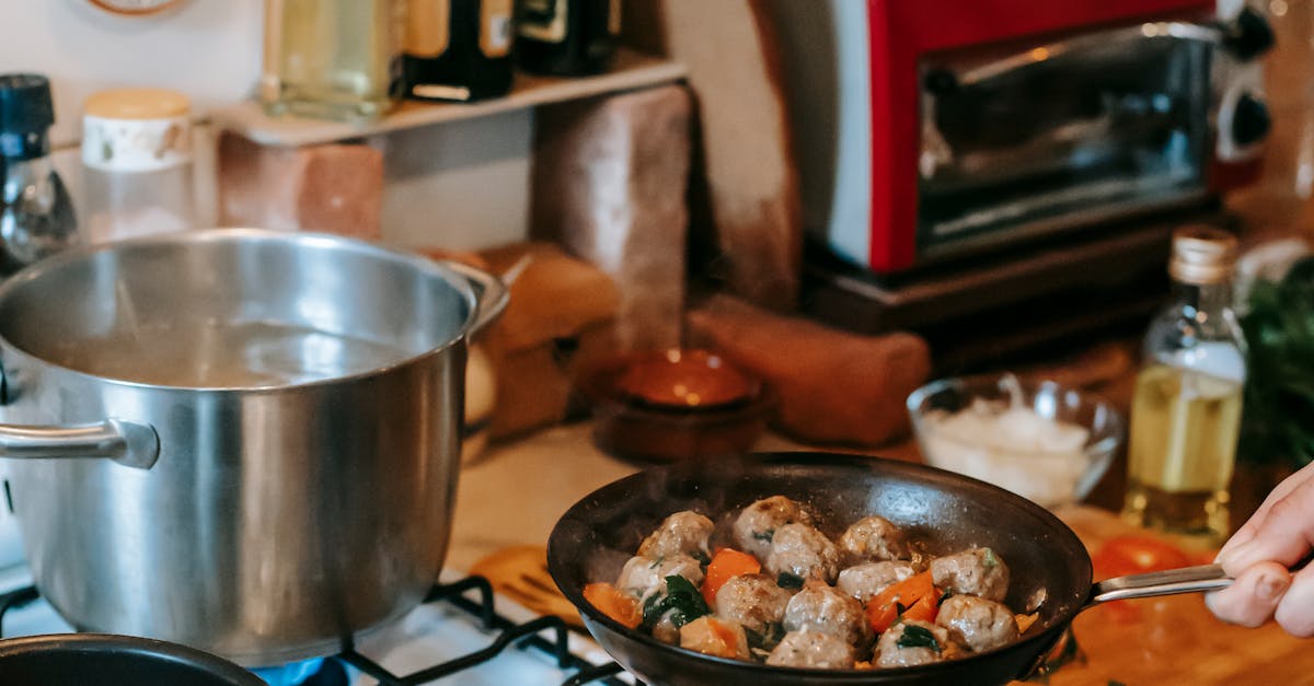 What maintenance should be done on a hot water tank?